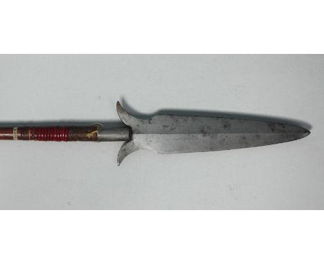 An Igorot head hunting spear (Falfeg), Philippines with tapering blade of flattened diamond section with curved spurs at the 