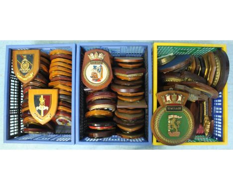A large quantity of approximately eighty four Army, Royal Navy and Air force crests / plaques, including a circular brass dis