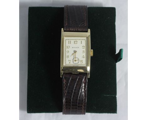 A gents Rolex wristwatch model '2732' c.1932, the rectangular white enamel dial with Arabic numerals denoting hours and subsi