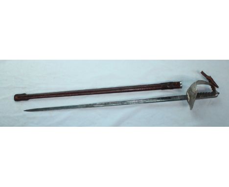 A 19th century and later Royal Marines sword, 32" blade with spear point, single fullered burnished blade with arabesque deco