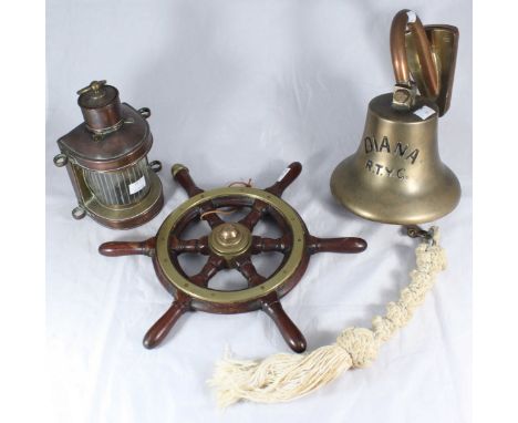 A small brass-mounted stained wood ship's wheel, together with a copper anchor light and brass bell cast with name 'Diana RTY