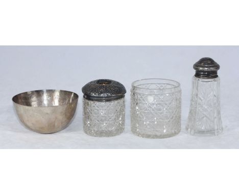 A small, plain white metal bowl (tests as silver) gross weight approximately 4.3ozt, together with a silver mounted sugar cas