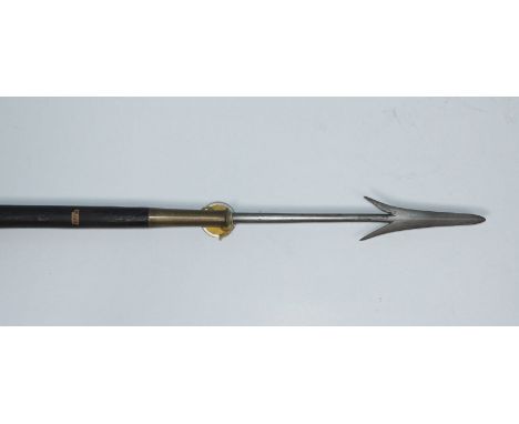 A late 19th early 20th hunting spear, possibly Philippines, with hand-forged barbed arrow tip and shaft to a brass ferrule an