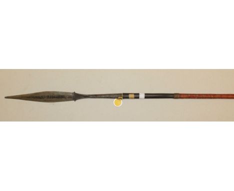 An Igorot hunting spear, Philippines with wrought-iron leaf-shaped blade with crimped tapering socket and spiked shoe-piece t