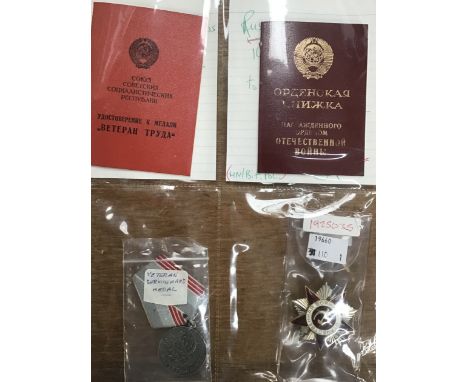 Good Condition of 14 Russian Medals annd issue cards/booklets all to one man Starting in WW2 and going on to the Cold War per