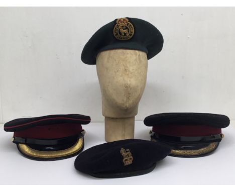 A selection of WW2 and Post War berets and Officers caps. To include: a green wool beret, badged for the Civil Defence Corps,