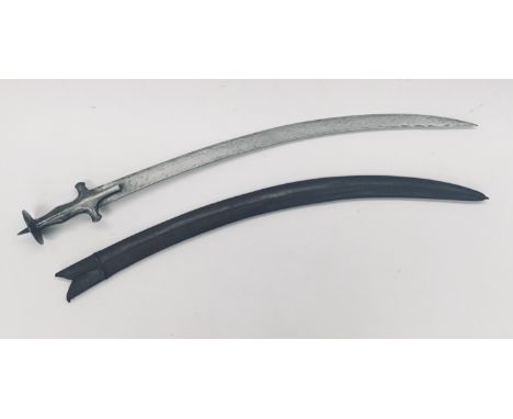 A late 19th century Indian Tulwar sword. Of traditional form, and of all steel construction. Disc shaped pommel with spike fi