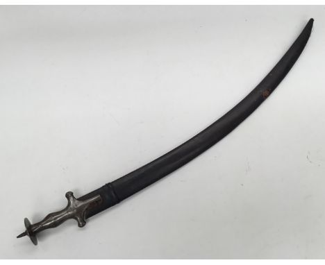 A late 19th / early 20th Indian talwar sword and scabbard. Of traditional form, all steel construction, with contoured handle