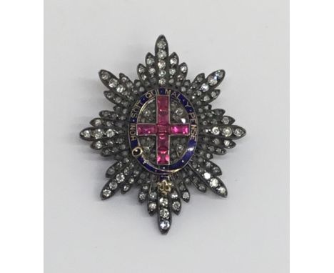 An early 20th century / WW1 era sweetheart brooch, depicting the badge of the Coldstream Guards. Comprising of a St George’s 