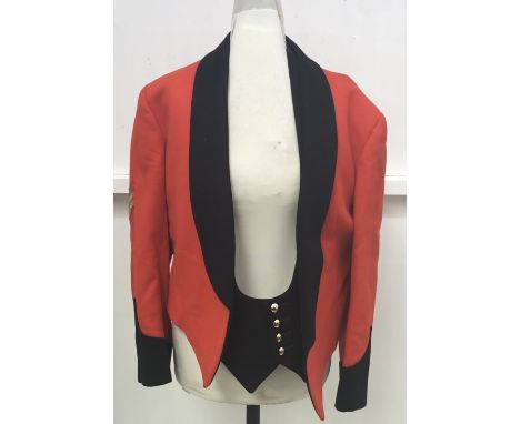A vintage Royal Corps of Signals mess jacket, waistcoat and associated trousers. Manufactured in scarlet wool with blue/black
