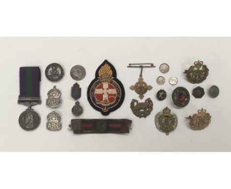 A selection of WW1, WW2, and later military and home front related items. To include: a 1918-62 General Service Medal with cl