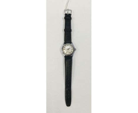 A vintage Tissot British military issued wristwatch. Silvered dial with Arabic numerals, and syringe style hands. Subsidiary 