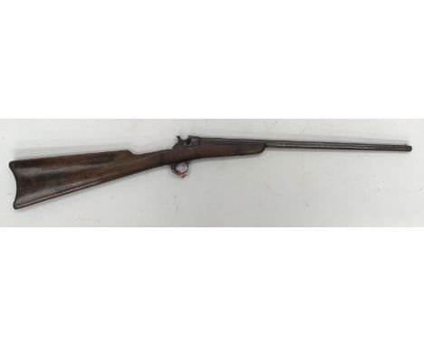 A Centre Fire .22 Rifle Octagonal 48cm Barrel stamped B4704, stock stamped A.C.CRUMPTON, working action fold down block missi