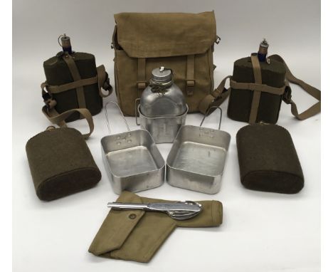 A selection of WW2 / Post War British Army Webbing equipment and accessories To include: a 1937 pattern webbing holster for a