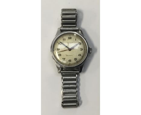 A rare WW2 era ‘Enicar Sport’ Air Ministry instrument / aerial camera watch. Stainless steel case with off white dial and lum