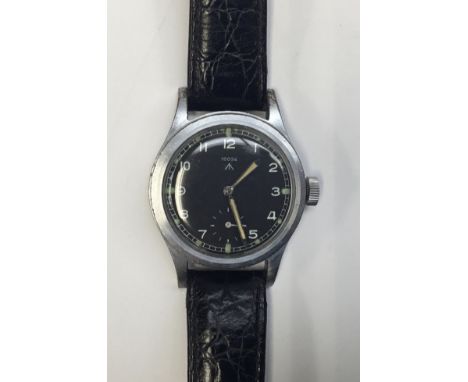 A WW2 issued ‘Dirty Dozen’ wristwatch by Record, circa 1945. Chromed case with black dial, subsidiary dial, and luminescent h