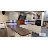 U Shaped Cream Display Kitchen with Dark Oak Effect Work Top with 3 Wall Units.