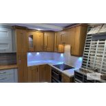 L shaped Display Kitchen with Light Oak Base & Wall Units with Light Work Top.