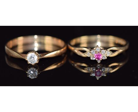 Two 9ct gold rings, one set with a diamond, the other with a ruby and diamonds, 3.4g, size P