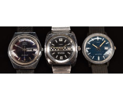 Three Timex gentleman's wristwatches comprising Electric Dynabeat, one with racing dial and one other, largest case diameter 