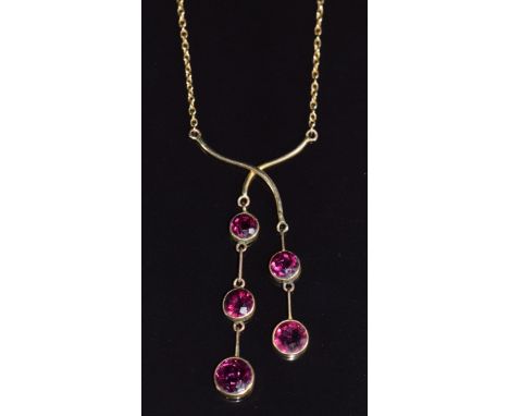 Edwardian&nbsp;9ct gold necklace set with five round cut garnets, in vintage box, pendant drop 5cm, on 43 cm chain 43cm, 5.2g