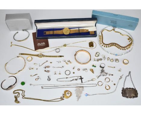 A collection of costume jewellery including watches, earrings, rolled gold bangles, silver rings, silver port label and 9ct g