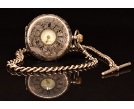 Silver keyless winding half hunter pocket watch with inset subsidiary seconds dial, gold hands, black Roman numerals, white e