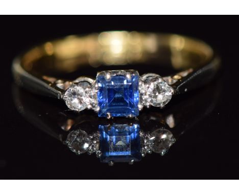 An 18ct gold ring set with a sapphire and diamonds, 1.8g, size L