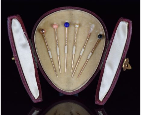 Victorian yellow metal stick pins set with coral, lapis lazuli, pearl and cat's eye chalcedony, in original box&nbsp;