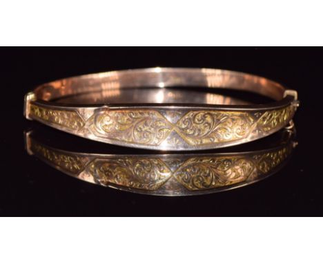 A 9ct rose gold bangle with engraved decoration, Chester 1914, 4.8 x 6cm - 6.2g