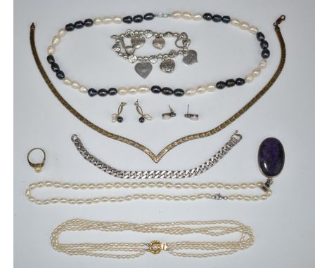 A silver curb link bracelet, silver earrings set with synthetic opals, silver gilt necklace, three pearl necklaces, silver br