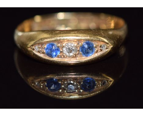 An 18ct gold ring set with diamonds and sapphires, Birmingham 1915, 2.2g, size M