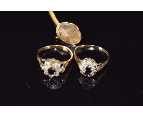 Two 9ct gold rings and a 9ct gold tie pin, 4.7g