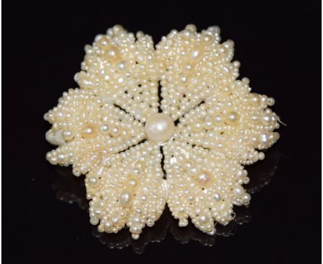 A 19thC seed pearl and pearl brooch threaded in a floral design, 10.4g, 4.5cm&nbsp;