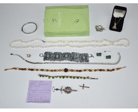 A collection of silver jewellery including&nbsp;Scottish brooch, cross, pendant, earrings and bangle together with a Trifari 