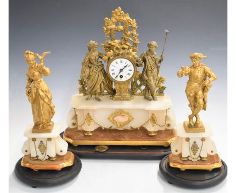 French 19thC&nbsp;figural clock garniture raised on an alabaster base and wooden stand, with single train movement and white 