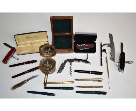 Brass Natural Sine compass, a collection of pens including Esterbrook, Parker Victory, Parker Slimfold, Golmet, and Parker Du