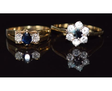 A 9ct gold ring set with a sapphire and diamonds and a 9ct gold ring set with paste, 4.8g, size U &amp; L