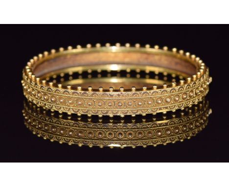 Victorian yellow metal bangle with sphere and filigree decoration, 14.8g, 4.5 x 5.5cm