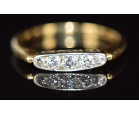 Art Deco 18ct gold ring set with five diamonds in a platinum setting, 2.6g, size N