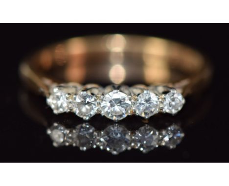 An 18ct gold ring set with a diamond in an platinum illusion setting, 2.1g, size K