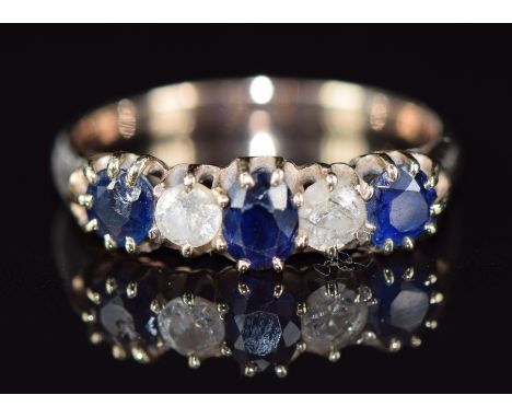 A 9ct gold ring set with sapphires and diamonds, 2.9g, size O