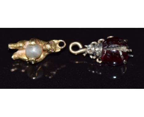 Victorian gold charm / pendant in the form of a ladybird set with garnets and rose cut diamonds and a Victorian gold charm in