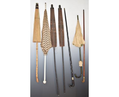 Vintage parasols and walking sticks including dog's head example