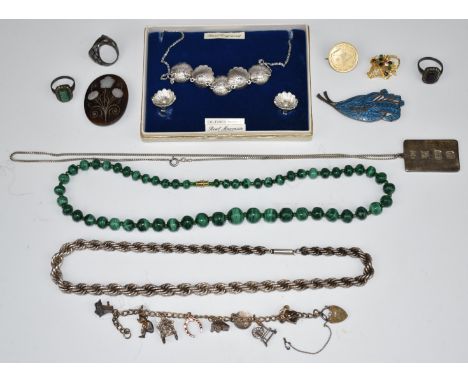 A silver rope twist necklace, silver ingot, Sphinx necklace and earrings, malachite beaded necklace, silver charm bracelet, s