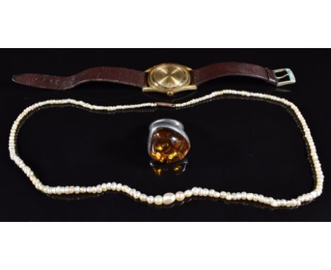 A silver ring set with a pressed amber cabochon, Accurist watch and natural pearl necklace with 9ct gold clasp (13g)