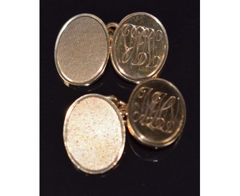 A pair of 9ct gold cufflinks with engine turned decoration, in Martin &amp; Co box, 14.7g