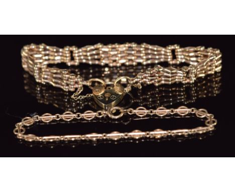 A 9ct gold gate bracelet with heart padlock clasp together with a 9ct rose gold bracelet, 21.5g, 18cm &amp; 17cm long&nbsp;