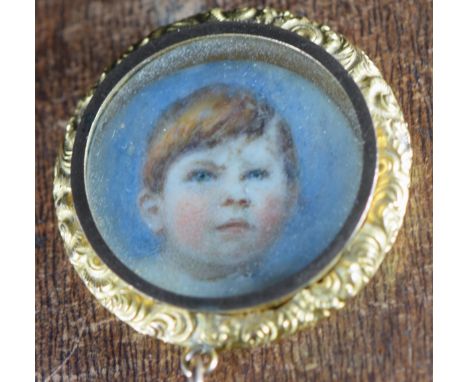 Victorian gold locket set with a portrait miniature of a young David Wormald 1907-1927 (3cm), verso engraved heart and foliat