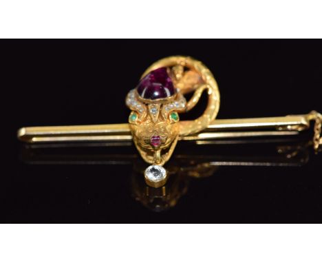 Victorian 9ct gold snake brooch set with a foiled pear shaped garnet cabochon, rose cut diamond, emerald eyes, ruby nose and 